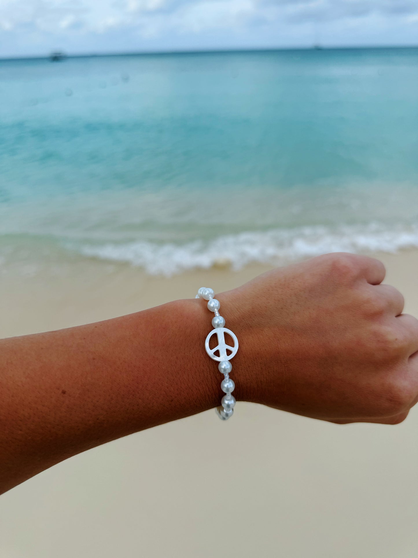 Clear Mother of Pearl Peace Pearl Bracelet